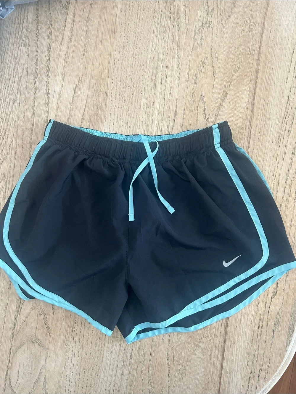 Nike Women's Black Shorts with Light Blue Trim
